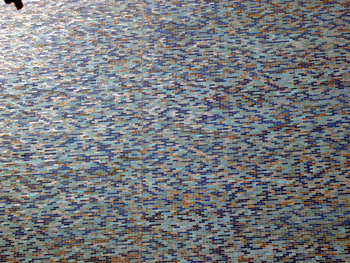 A mosaic tile pattern made from the bricks of a building in downtown Tucson, Arizona.